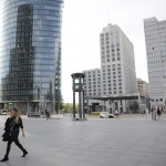 A Woman Walks Across Potsdamer Platz In Berlin, Germany