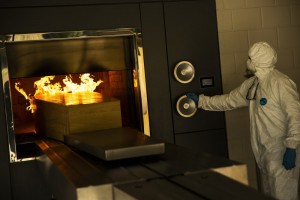 A Worker Moves A Casket Of A Covid 19 Deceased Into The Crematorium Oven At The Pontes Crematorium And Funeral Center In Lommel, Belgium
