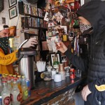 Derek Tigue Toasts A Walk In Customer At Fmn General Store