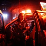 Fdny Paramedic Elizabeth Bonilla Sprays Herself With Disinfectant After Responding To An Emergency Call During The Coronavirus Outbreak Wednesday, April 15, 2020