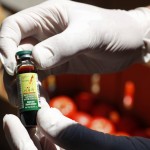 Fmn General Store Managing Partner Derek Tigue Holds A Bottle Of Ginseng Extract