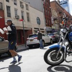 Fmn General Store Owner Paul Sierros Carries Paper Towels To A Customer's Car During The Coronavirus Outbreak