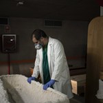 Head Mortician Jordi Fernandez Prepares A Coffin Before Placing The Body Of A Covid 19 Victim