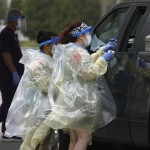 Medical Personnel Conduct Coronavirus Drive Thru Testing Outside Daytona International Speedway