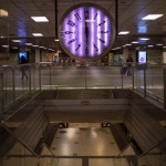 People Walk In An Almost Empty Train Station In Barcelona, Spain