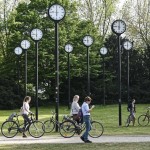 People With Bicycles Meet At The Clock Park In Duesseldorf, Germany