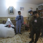 Police Officers Arrive To Escort Ahmed Khaled Al Kaabi And His Bride Ruqaya Rahim During Their Wedding In Najaf, Iraq