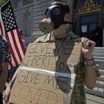 A Protester In Favor Of Re Opening California To Business And The Restoration Of What They Feel To Be The Restriction On Civil Liberties Due To The Covid 19