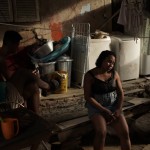 Manicurist And Mother Of Seven Children Leticia Machado, Who Is Jobless Due To The Novel Coranvirus Pandemic, Sits Listlessly On A Bench In Her Home At The Turano Favela, In Rio De Janeiro
