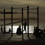 People Exercises In A Seafront Promenade In Barcelona, Spain