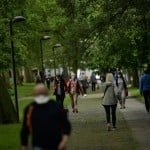 People Wearing Face Masks To Prevent The Spread Of Coronavirus Walk Along Vuelta Del Castillo Park, In Pamplona,