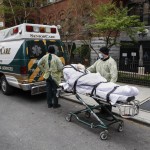 Patient Is Wheeled Out Of Cobble Hill Health Center By Emergency Medical Workers In The Brooklyn Borough Of New York