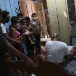 Relatives Gather Around The Body Of Raimundo Costa Do Nascimento, 86, Who Died In His Home Of Pneumonia, Amid The New Coronavirus Pandemic At The Sao Jorge Neighborhood In Manaus, Brazil