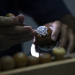A Worker For The Israeli Jewelry Company Yvel Holds A Part Of A Mask In Motza Near Jerusalem
