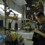 Edmond Kok, A Hong Kong Theater Costume Designer And Actor, Is Making A Face Mask At His Studio In Hong Kong