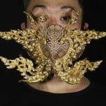 Edmond Kok, A Hong Kong Theater Costume Designer And Actor, Wearing A Face Mask Inspired By The Decoration Of Thai Temple To Kok's Face In Hong Kong