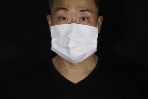 Edmond Kok, A Hong Kong Theater Costume Designer And Actor, Wearing A Face Mask Made By A White Paper In Hong Kong