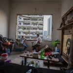 Fouad Armali Smokes Water Pipe In His Destroyed Apartment At Gemmayzeh Neighborhood, Which Suffered Extensive Damage From The Tuesday's Explosion
