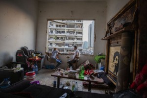 Fouad Armali Smokes Water Pipe In His Destroyed Apartment At Gemmayzeh Neighborhood, Which Suffered Extensive Damage From The Tuesday's Explosion