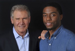 Harrison Ford, Left, And Chadwick Boseman, Cast Members In The Film "42," Pose Together For A Portrait, In Los Angeles.