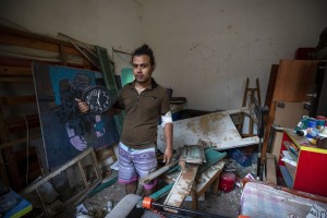 Hasan Al Armali, Holds A Wall Clock That Was Stoped Working At The Time Of The Tuesday's Explosion In The Seaport Of Beirut, Poses For A Photograph At His Bedroom Inside His Destroyed Apartment