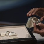Isaac Levy, Owner Of Israeli Jewelry Company Yvel Holds Parts Of A Mask In Motza Near Jerusalem