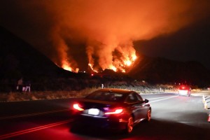 Motorists Make Their Way Along A Road As The Ranch Fire Burns, Thursday, Aug. 13, 2020, In Azusa, Calif.