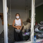 Sandrine Zeinoun, 34, Poses For A Photograph Inside Her Destroyed Apartment After Tuesday's Explosion