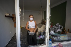 Sandrine Zeinoun, 34, Poses For A Photograph Inside Her Destroyed Apartment After Tuesday's Explosion