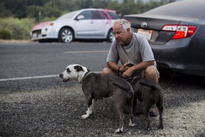 Tiger Wiggles, 57, With His Dogs Wait To Go Back Home During The Lake Hughes Fire In Angeles National Forest On Thursday, Aug. 13, 2020
