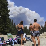 A Family From Ventura County Watches, From The Shore Of Shaver Lake, The Billowing Smoke From The Creek Fire