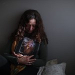 Fernanda Mariotti Cradles A Picture Of Her Mother Martha Pedrotti, Who Passed Away A Victim Of Covid 19, At Her Home In Buenos Aires, Argentina