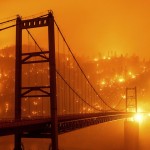 In This Image Taken With A Slow Shutter Speed, Embers Light Up A Hillside Behind The Bidwell Bar Bridge As The Bear Fire Burns In Oroville, Calif
