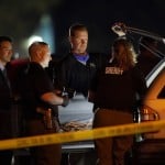 Law Enforcement Officials Search A Vehicle, Thursday