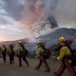 Members Of Firefighters Walk In Line During A Wildfire In Yucaipa, Calif