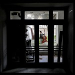 Musician Arif Mirbaghi Plays Double Bass At The Yard Of His House During Mandatory Self Isolation Due To The Coronavirus Outbreak In Tehran, Iran