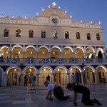 Pilgrims Crawl In Front Of The Holy Church Of Panagia Of Tinos, On The Aegean Island Of Tinos, Greece