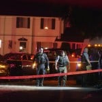 Police Officials Work At A Scene Where A Man Suspected Of Fatally Shooting A Supporter Of A Right Wing Group In Portland, Ore