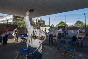Rabbi David Mason Leads The First Sunday Communal Prayer Service Which Was Streamed To His Congregation From The Muswell Hill Synagogue Parking Lot In London