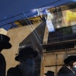 Ultra Orthodox Jews, Followers Of The Hasidic Sect Of Shomrei Emunim, Wearing Protective Face Masks Amid Concerns Over The Country's Coronavirus Outbreak