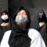 Women Wearing Protective Face Masks To Help Prevent Spread Of The Coronavirus Mourn During An Annual Ceremony Commemorating Ashoura At The Saleh Shrine In Northern Tehran, Iran