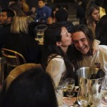 A Couple Kiss During A Drink On The Terrace Of A Restaurant Before The Nightly Curfew Due To The Restrictions Against The Spread Of Coronavirus, In Paris, France, Friday, Oct. 23,