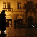 A Nun Prays On The Near Empty Old Town Square In Prague, Czech Republic, Friday, Oct. 23