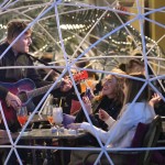 An Entertainer Plays For People Sitting In Restaurants In The Old Part Of Bucharest, Romania, Friday, Oct. 23
