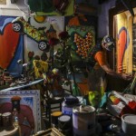 Painter Works At His Studio At The Naviglio Grande District, In Milan, Italy, Friday, Oct. 23