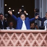 Diego Maradona Flashes Victory Signs To Fans Below At The Casa Rosada Government House After Meeting With Argentine President Alberto Fernandez In Buenos Aires, Argentina