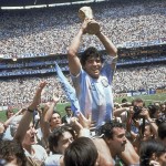 In This June 29, 1986 File Photo, Diego Maradona Holds Up His Team's Trophy After Argentina's 3 2 Victory Over West Germany At The World Cup Final Soccer Match At Azteca Stadium In Mexico City