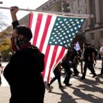 People Wearing Pro Proud Boys Clothing March Down Pennsylvania Avenue With Supporters Of President Donald Trump, Saturday Nov. 14, 2020, In Washington.