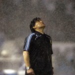 Under The Pouring Rain, Argentina's Coach Diego Maradona Looks Up Under The Pouring Rain During A 2010 World Cup Qualifying Soccer Match Against Peru, In Buenos Aires. Argentina Won 2 1