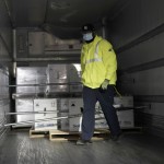 A Worker Places Boxes Containing The Pfizer Biontech Covid 19 Vaccine On A Truck To Be Shipped At The Pfizer Global Supply Kalamazoo